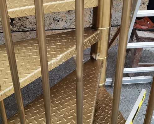 stainless steel spiral brushed titanium birdcage staircases0 case study image-stainless steel titanium gold staircase