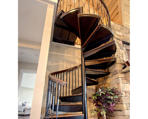 Outdoor metal spiral staircase with iron railing wooden treads