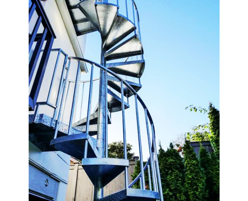 factory picutre-steel spiral staircase with wooden treads iron railing