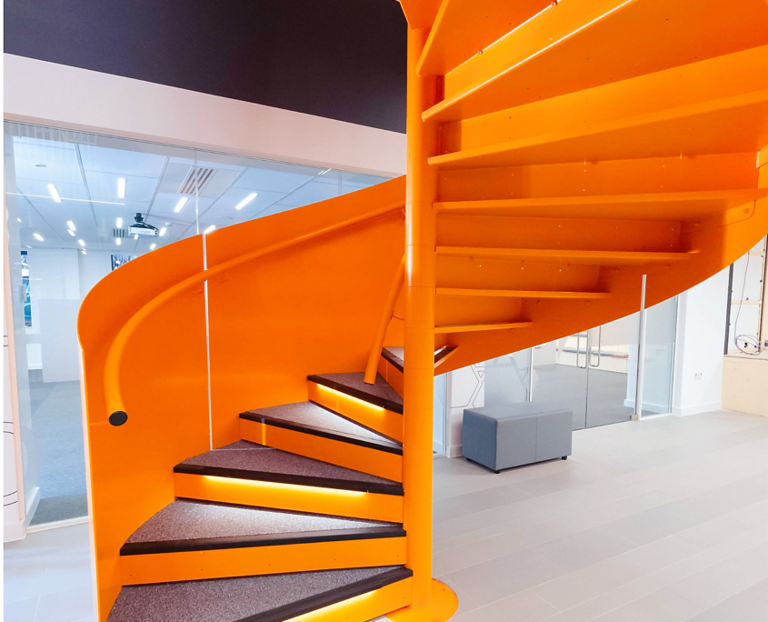 Prefab spiral staircase with sided steel plate railing